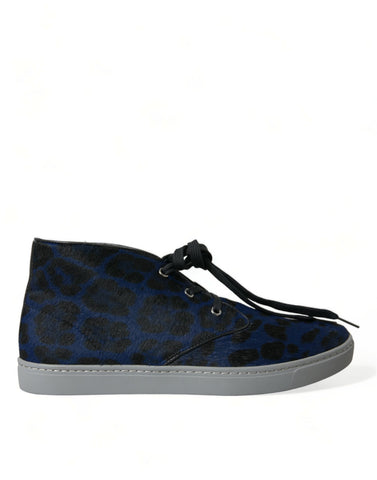 Blue calfskin leopard-print mid-top sneakers from Dolce & Gabbana with white rubber soles and stylish ankle design.