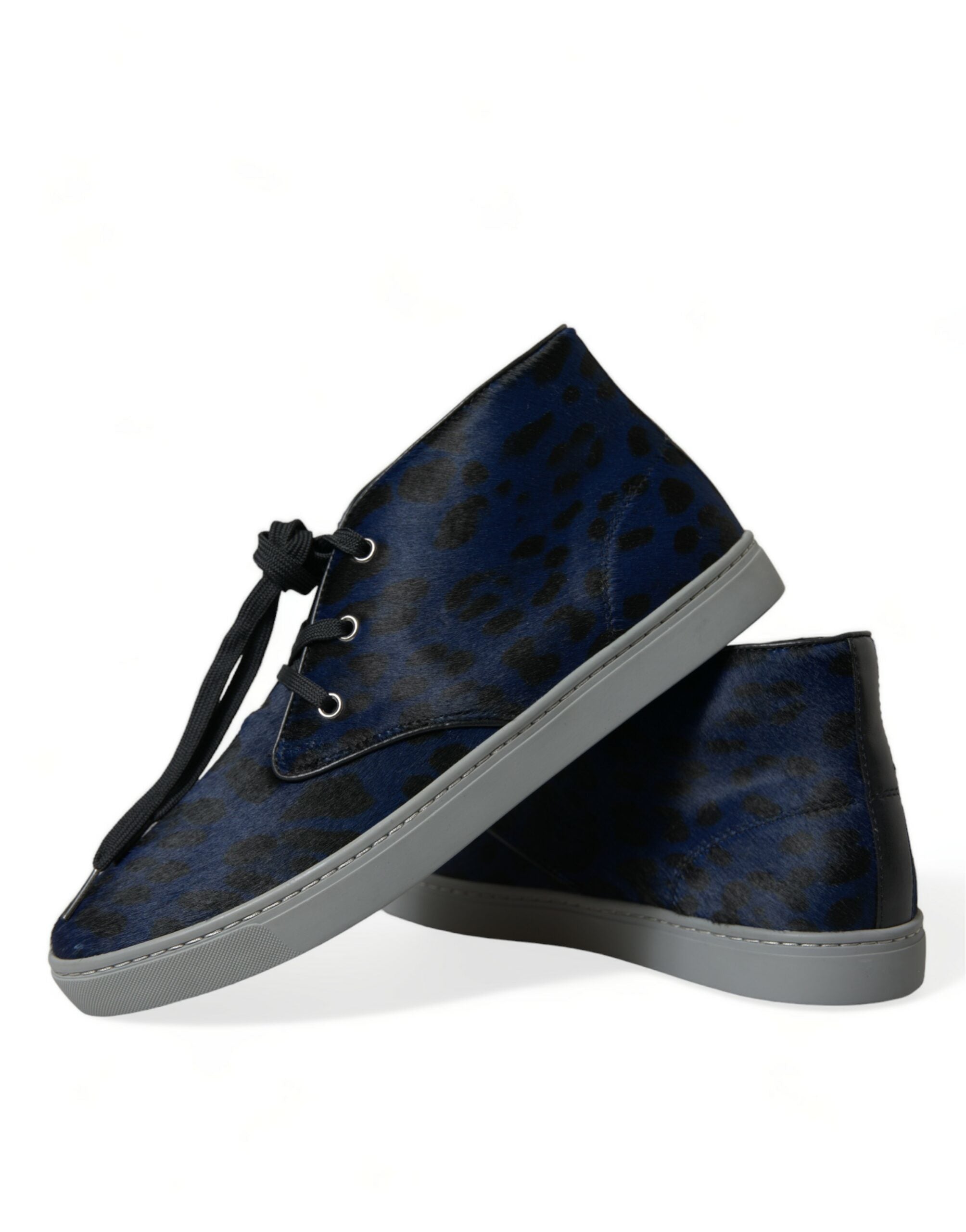 Blue calfskin leopard print mid-top sneakers by Dolce & Gabbana featuring stylish laces and a sleek design.