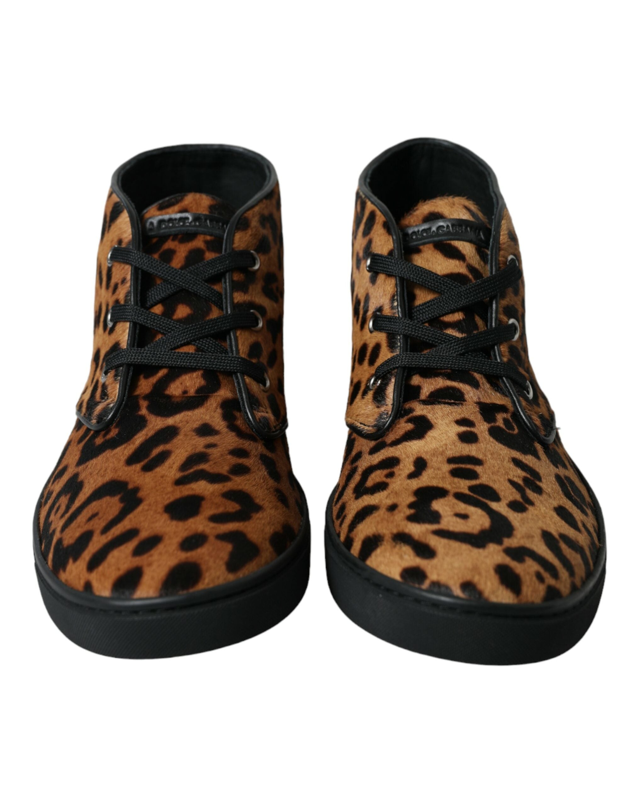 Brown leopard print pony hair leather sneakers by Dolce & Gabbana with white rubber soles and laces.