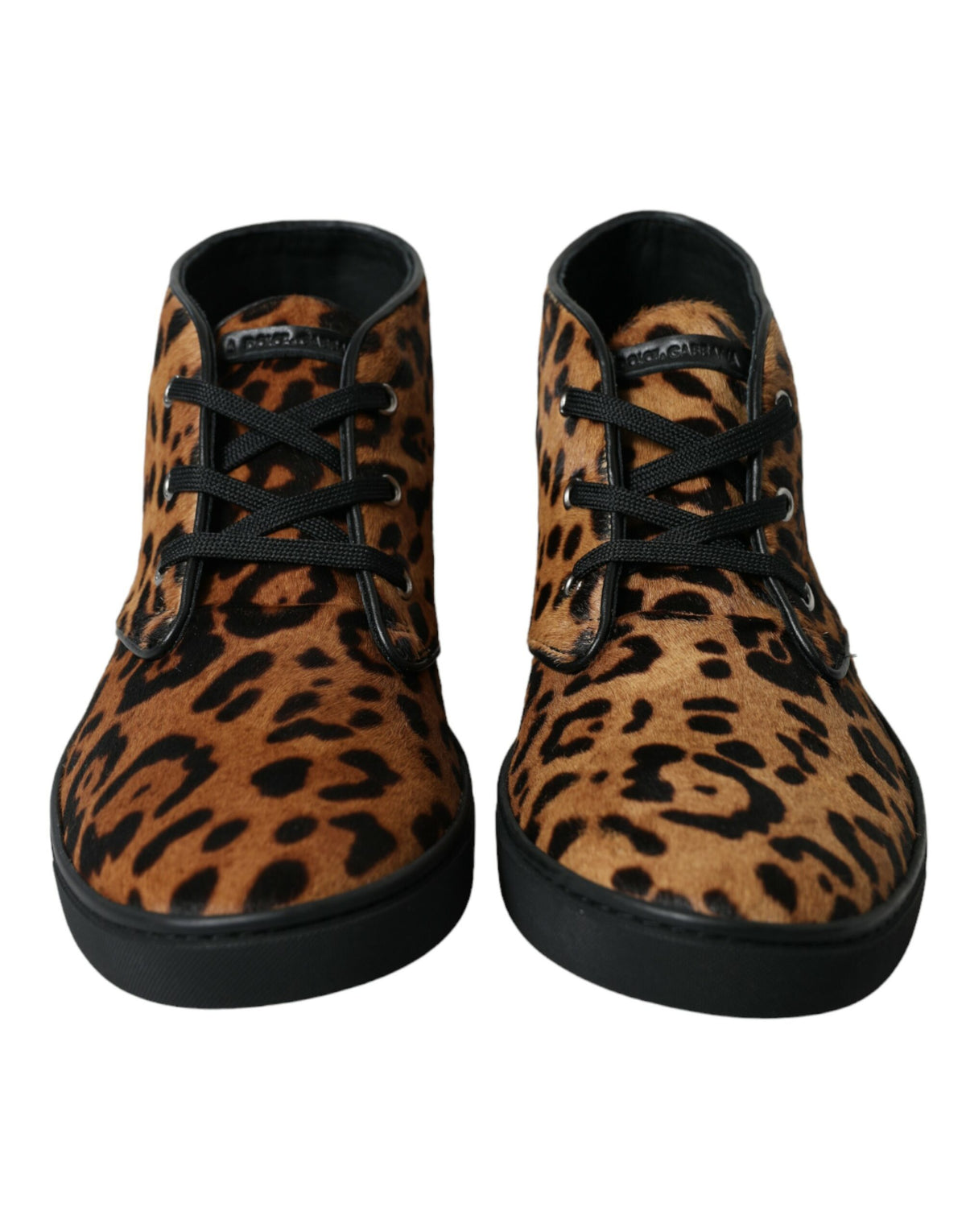 Brown leopard print pony hair leather sneakers by Dolce & Gabbana with white rubber soles and laces.