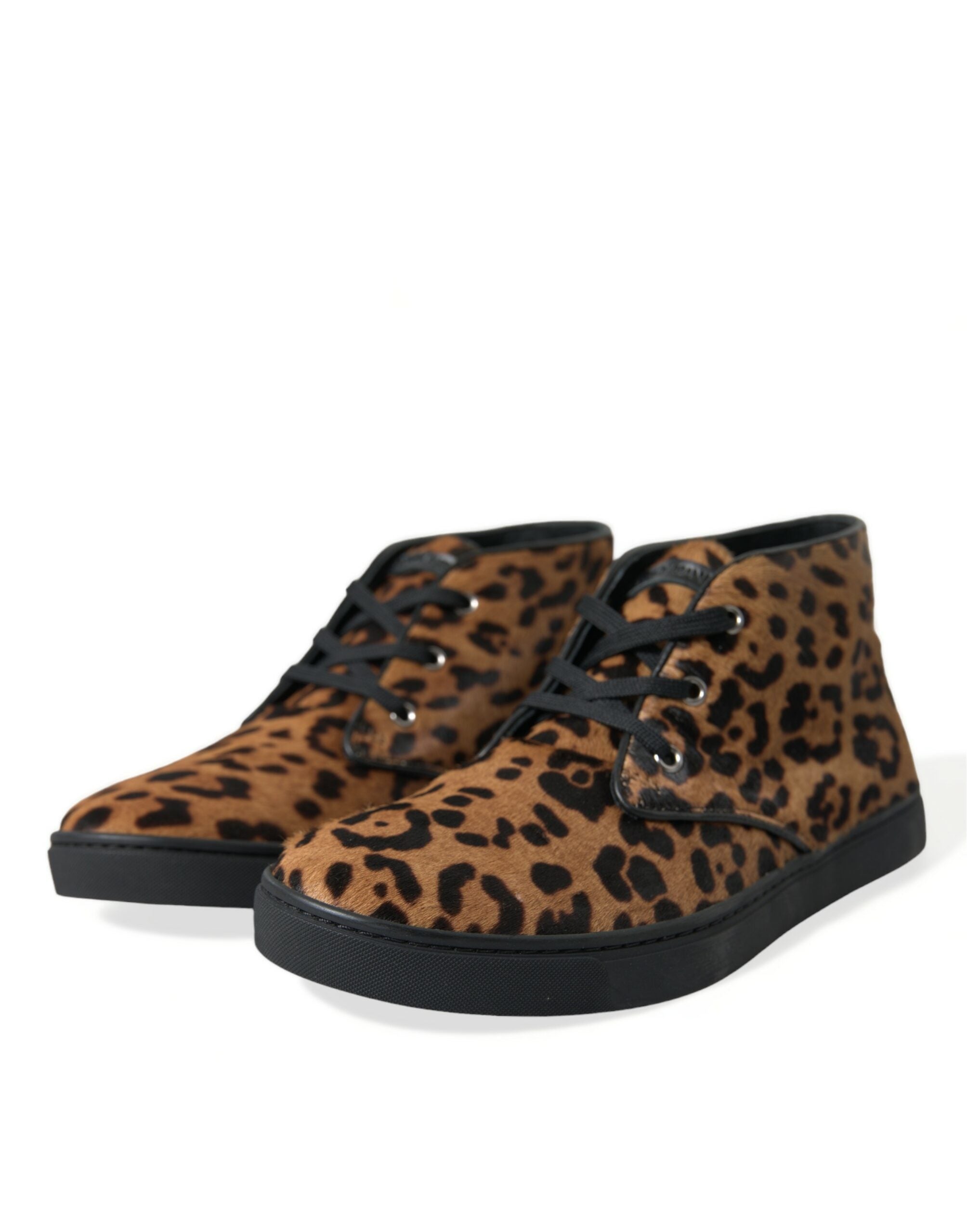 Brown leopard print pony hair leather sneakers by Dolce & Gabbana with white rubber soles and lace-up design.