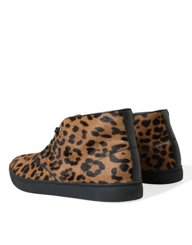 Brown leopard print pony hair leather sneakers by Dolce & Gabbana with white soles and stylish design.