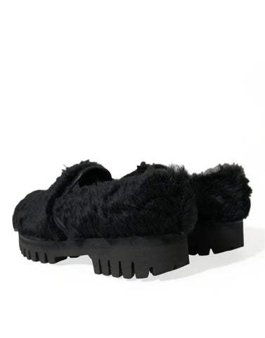 Black fur leather slippers dress shoes by Dolce & Gabbana showing a sleek, stylish design with fur accents and leather finish.