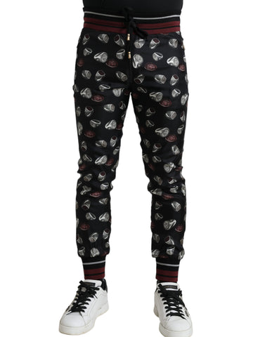 Black silk jogging trousers from Dolce & Gabbana featuring a relaxed fit and casual style for comfortable wear.