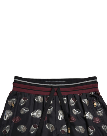 Black silk jogging trousers from Dolce & Gabbana featuring a relaxed fit and stylish design.