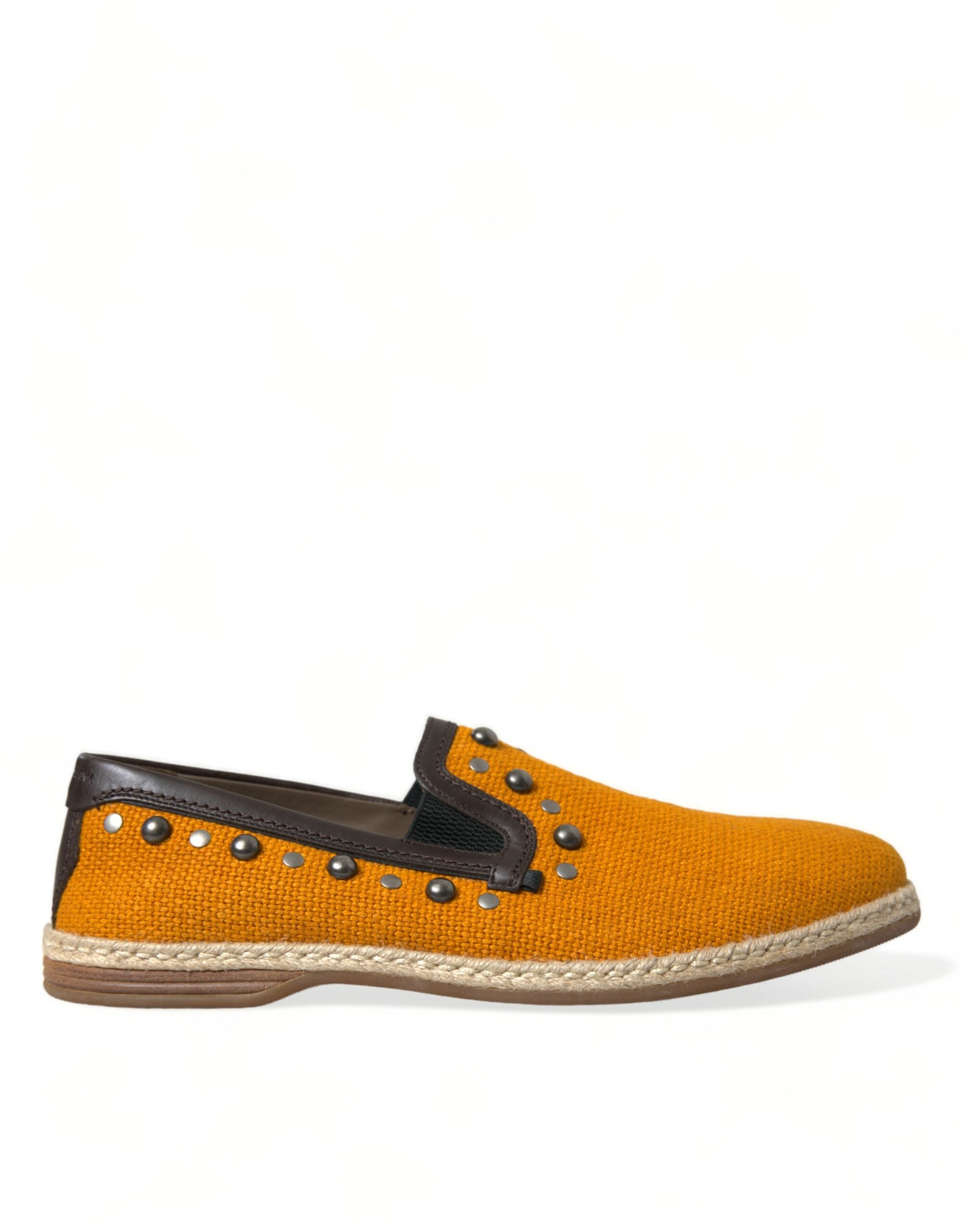 Orange linen and leather studded loafers shoes by Dolce & Gabbana with detailed stud accents and classic slip-on style.