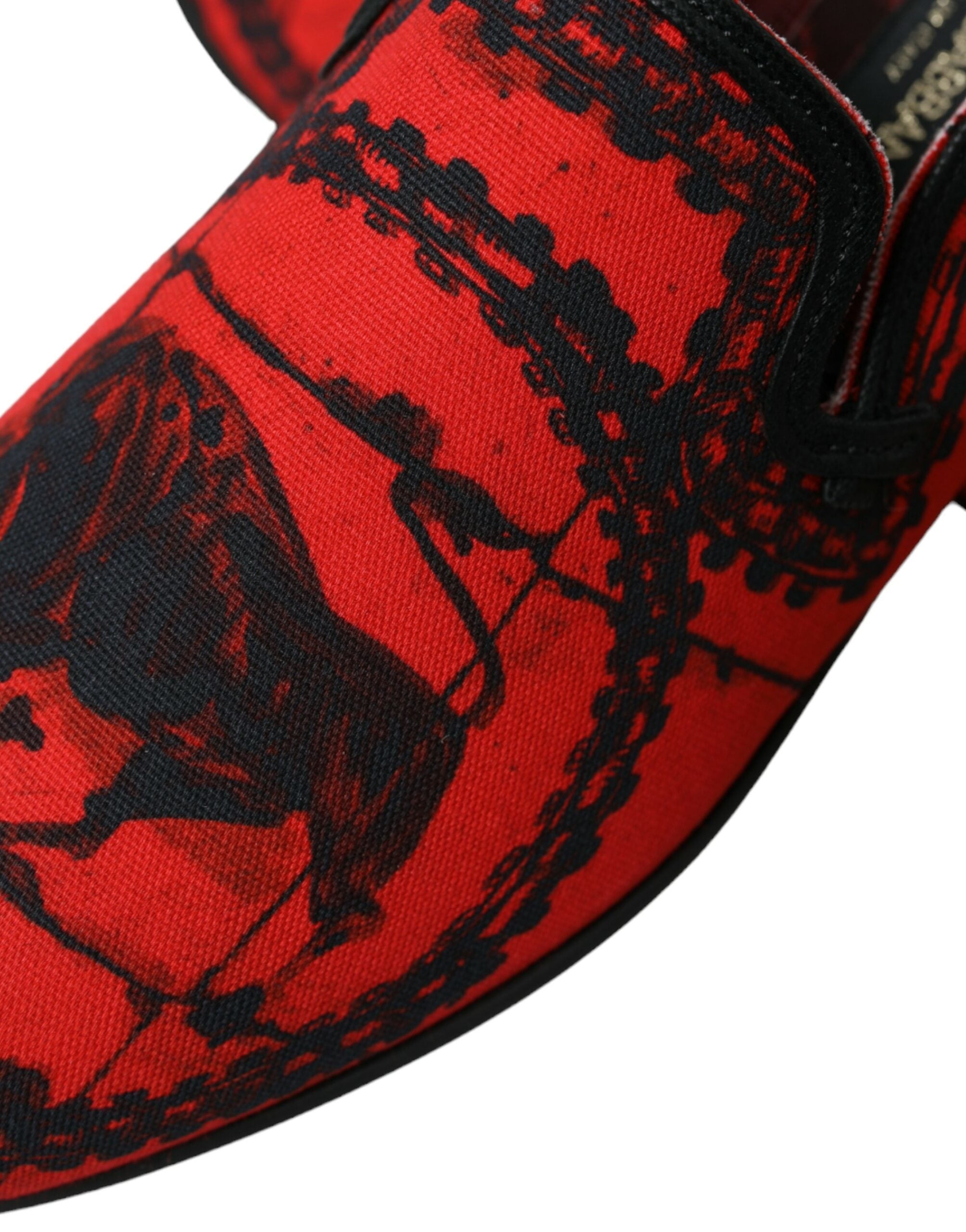 Red and black Torero loafers slippers for men by Dolce & Gabbana, featuring a stylish slip-on design and premium leather material.