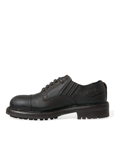 Brown leather lace-up derby men's dress shoes by Dolce & Gabbana, showing polished leather and classic design.