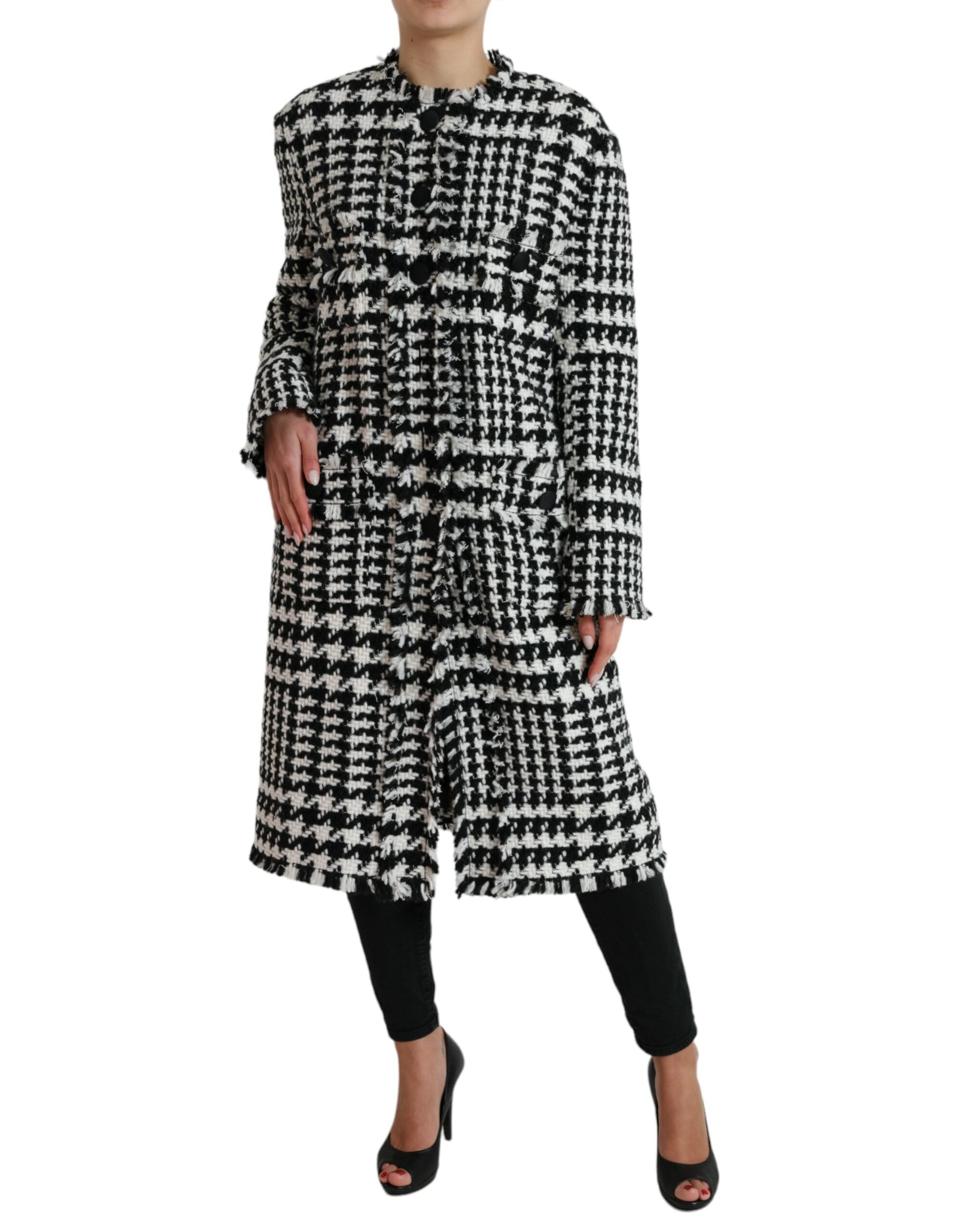 Black and white houndstooth trench coat jacket by Dolce & Gabbana, featuring classic design and tailored fit.