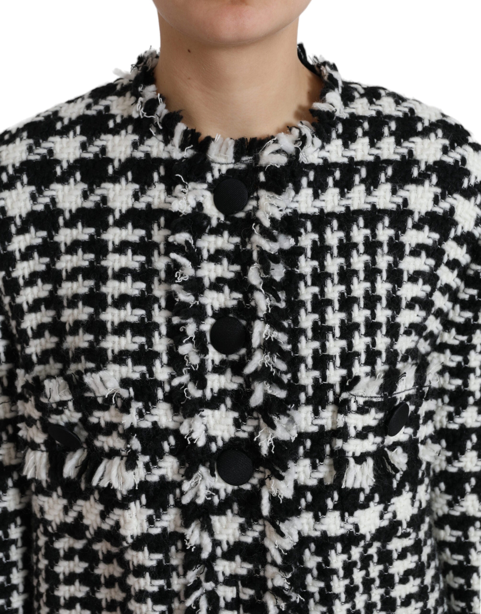 Black and white houndstooth trench coat jacket by Dolce & Gabbana, featuring classic design and tailored fit.