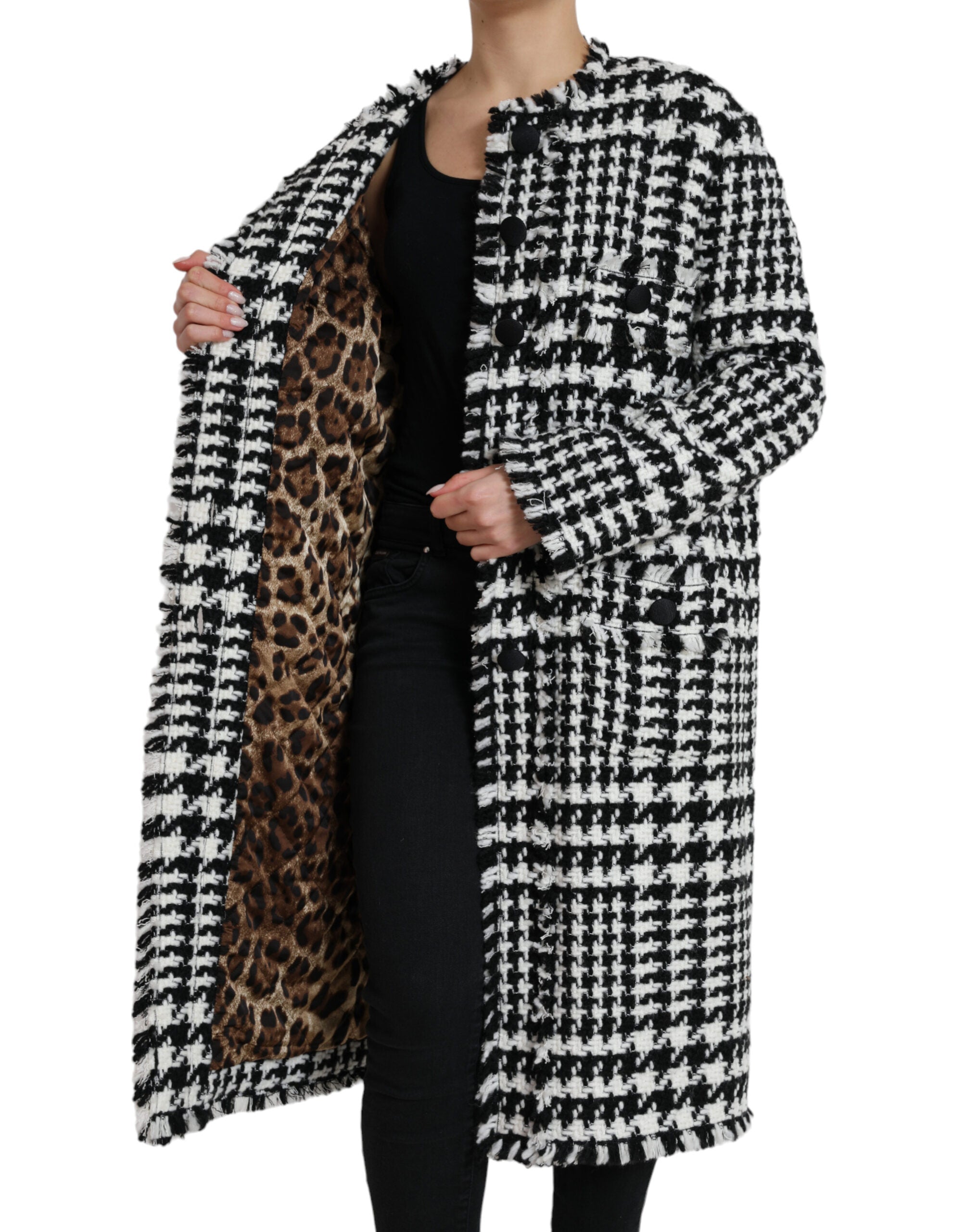 Black and white houndstooth trench coat jacket by Dolce & Gabbana, featuring classic design and tailored fit.
