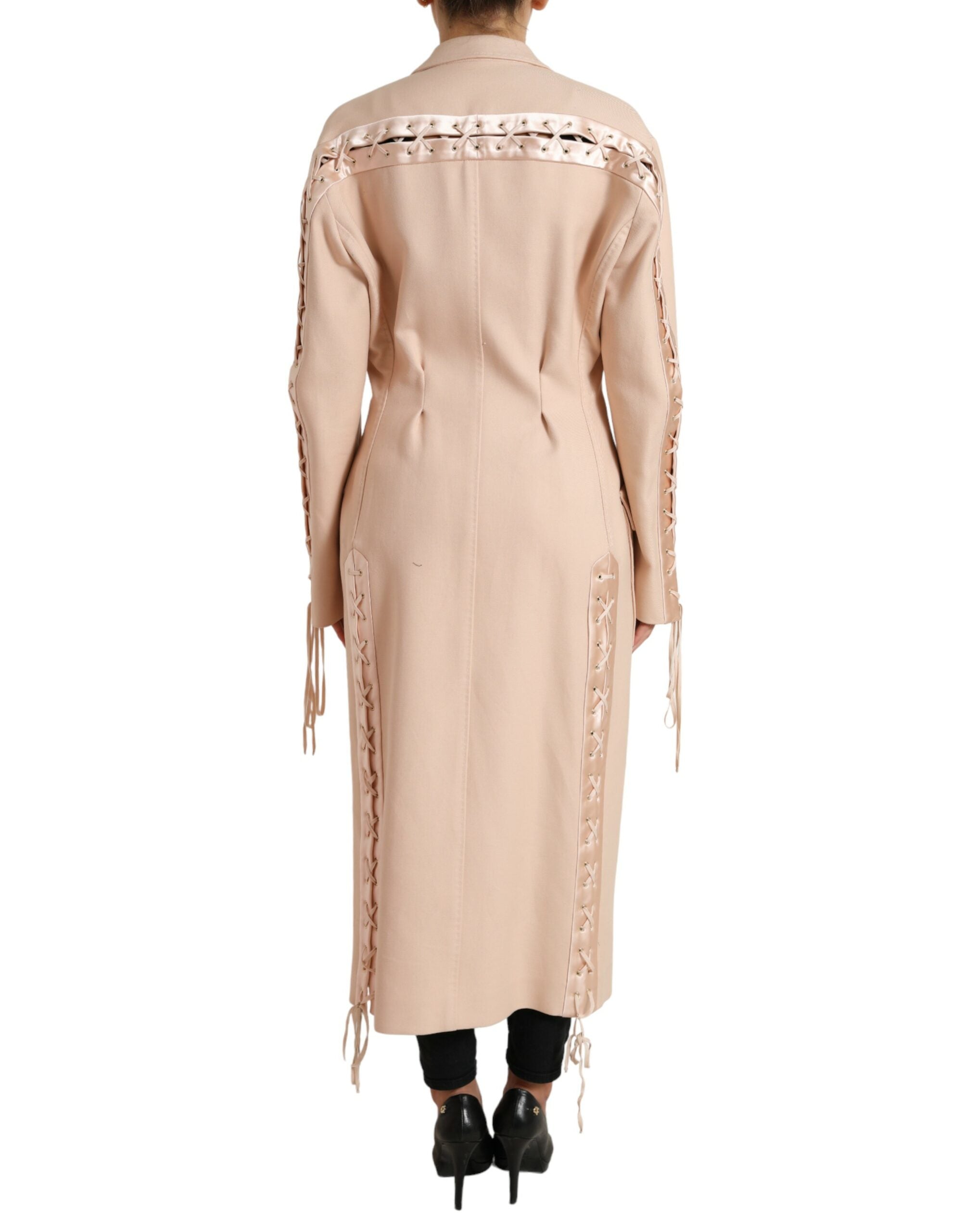 Beige cotton single-breasted long coat jacket by Dolce & Gabbana, displayed on a hanger.