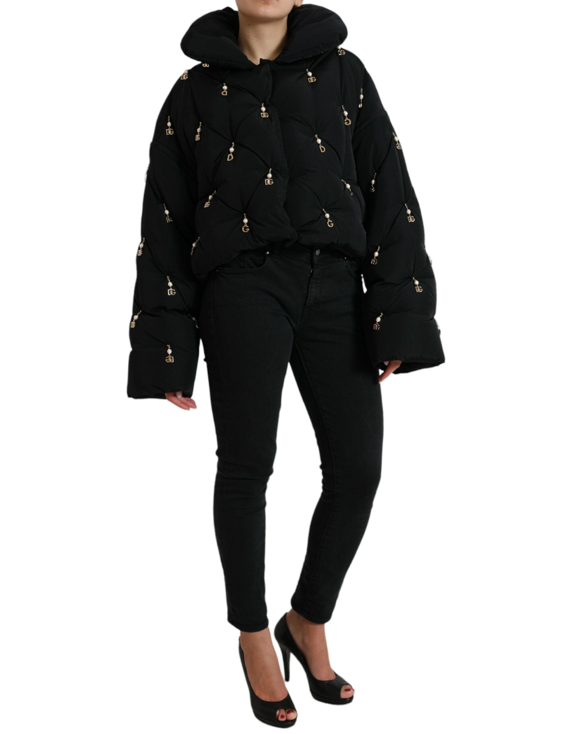 Black embellished quilted shell bomber jacket by Dolce & Gabbana featuring decorative beads and a ribbed collar.