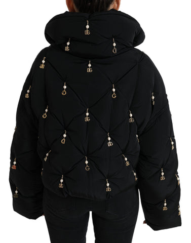 Black embellished quilted shell bomber jacket by Dolce & Gabbana with intricate embroidery and a sleek, modern design.