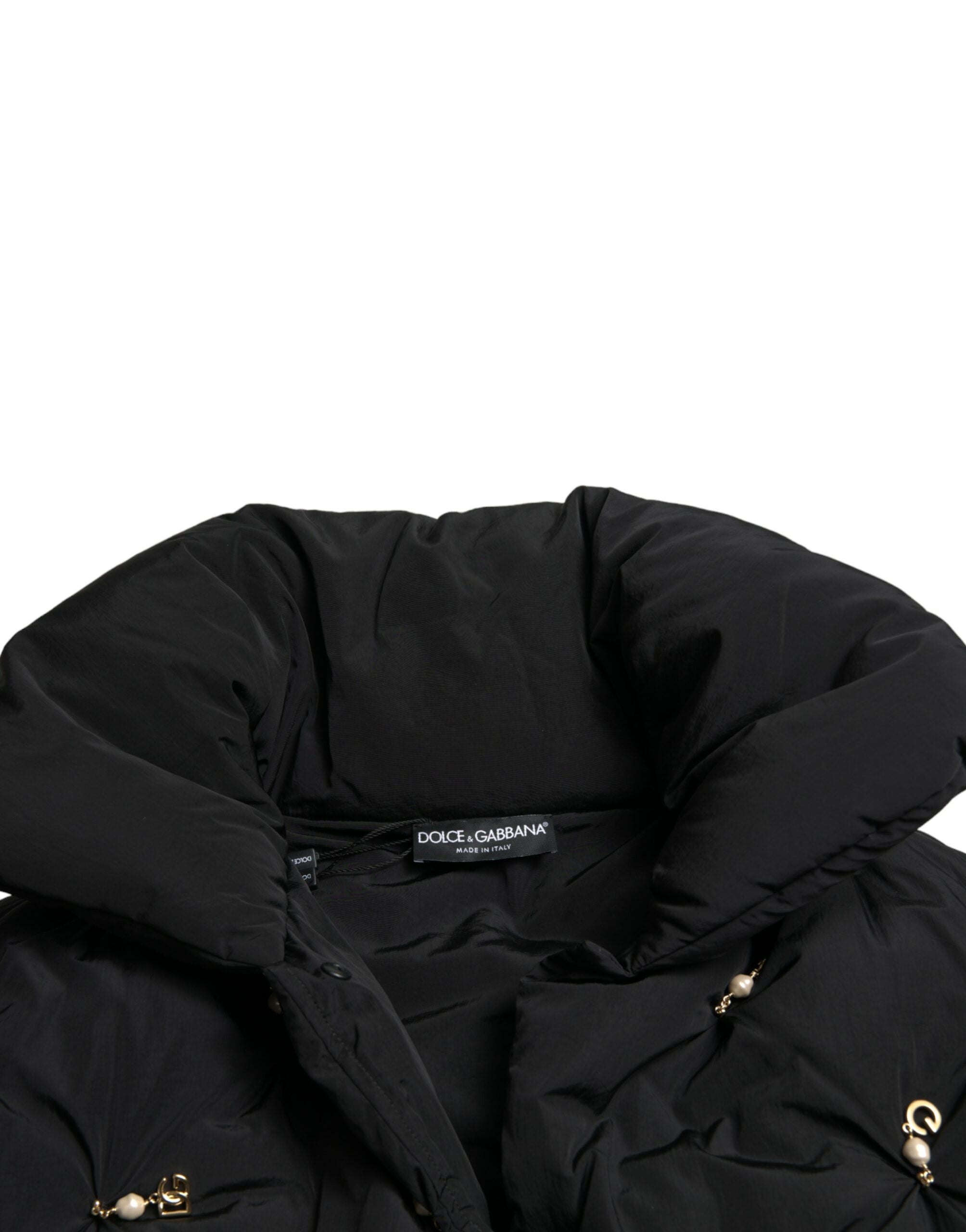 Black embellished quilted shell bomber jacket by Dolce & Gabbana with intricate embroidery and a front zipper closure.