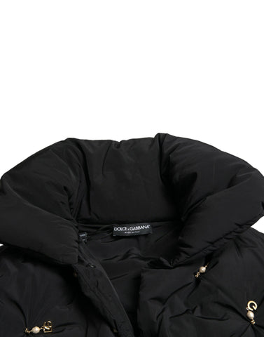 Black embellished quilted shell bomber jacket by Dolce & Gabbana with intricate embroidery and a front zipper closure.