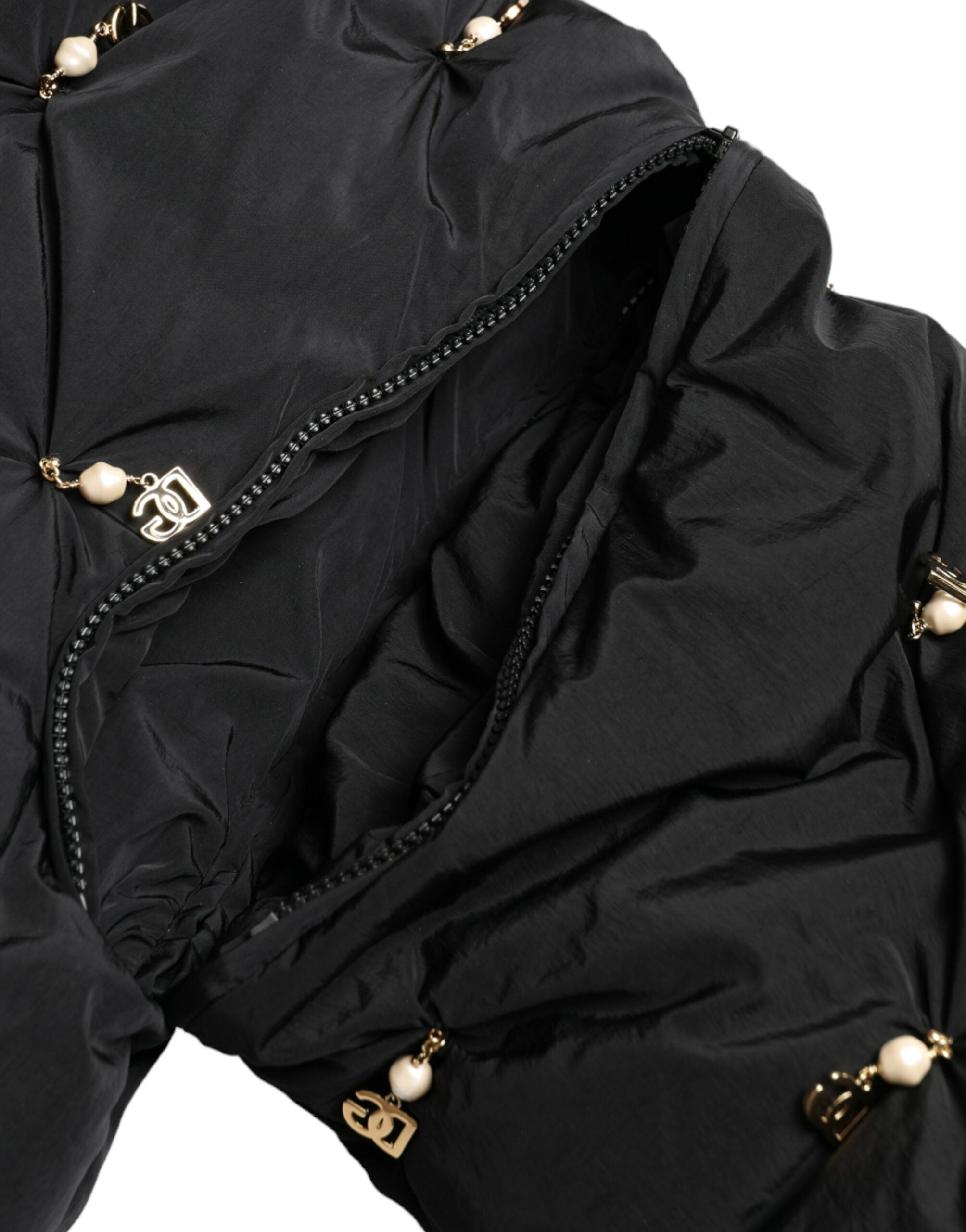 Black embellished quilted shell bomber jacket by Dolce & Gabbana with intricate embroidery and a stylish, fitted design.