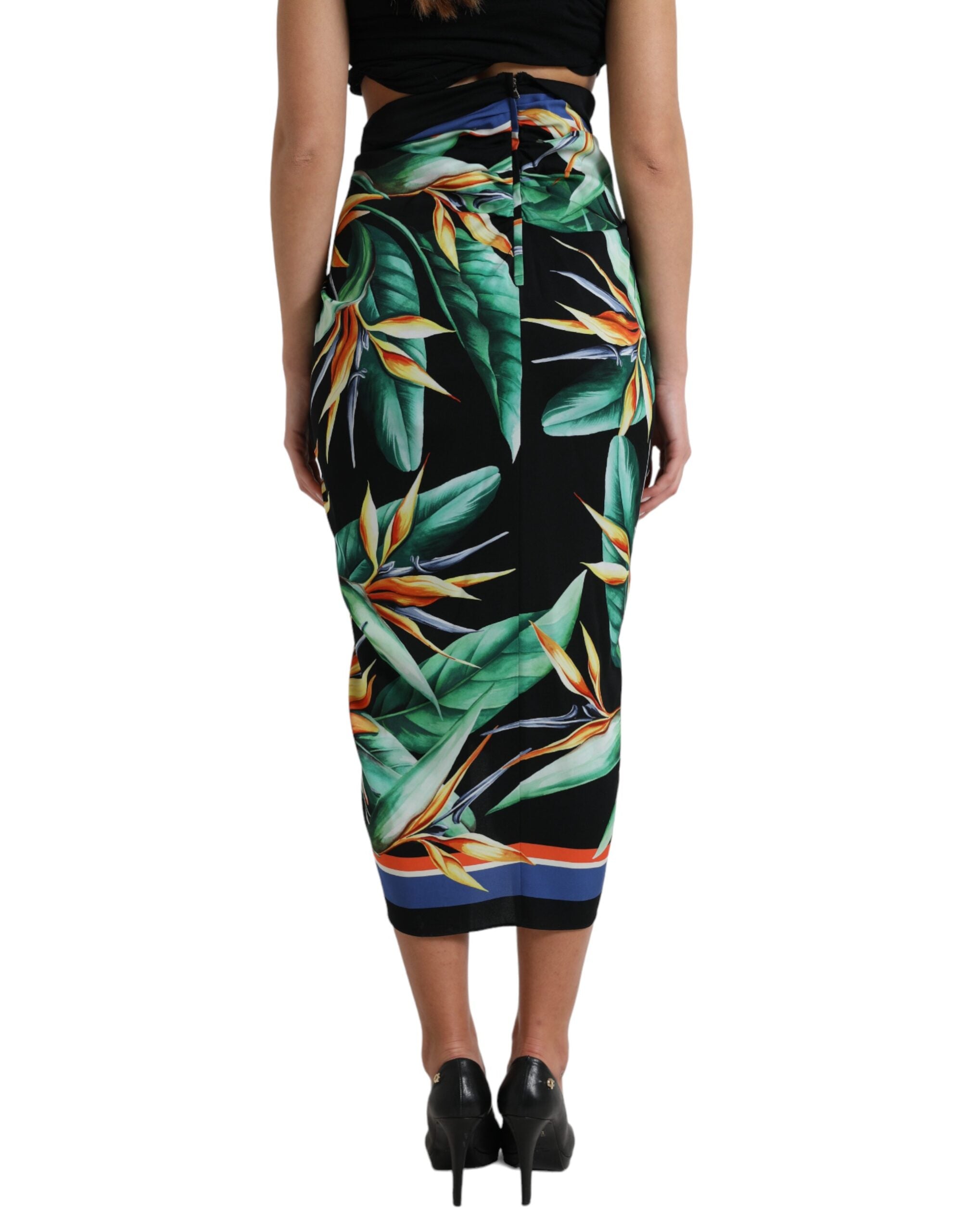 Black Strelitzia high waist wrap midi skirt by Dolce & Gabbana, shown with flowing fabric and elegant design.