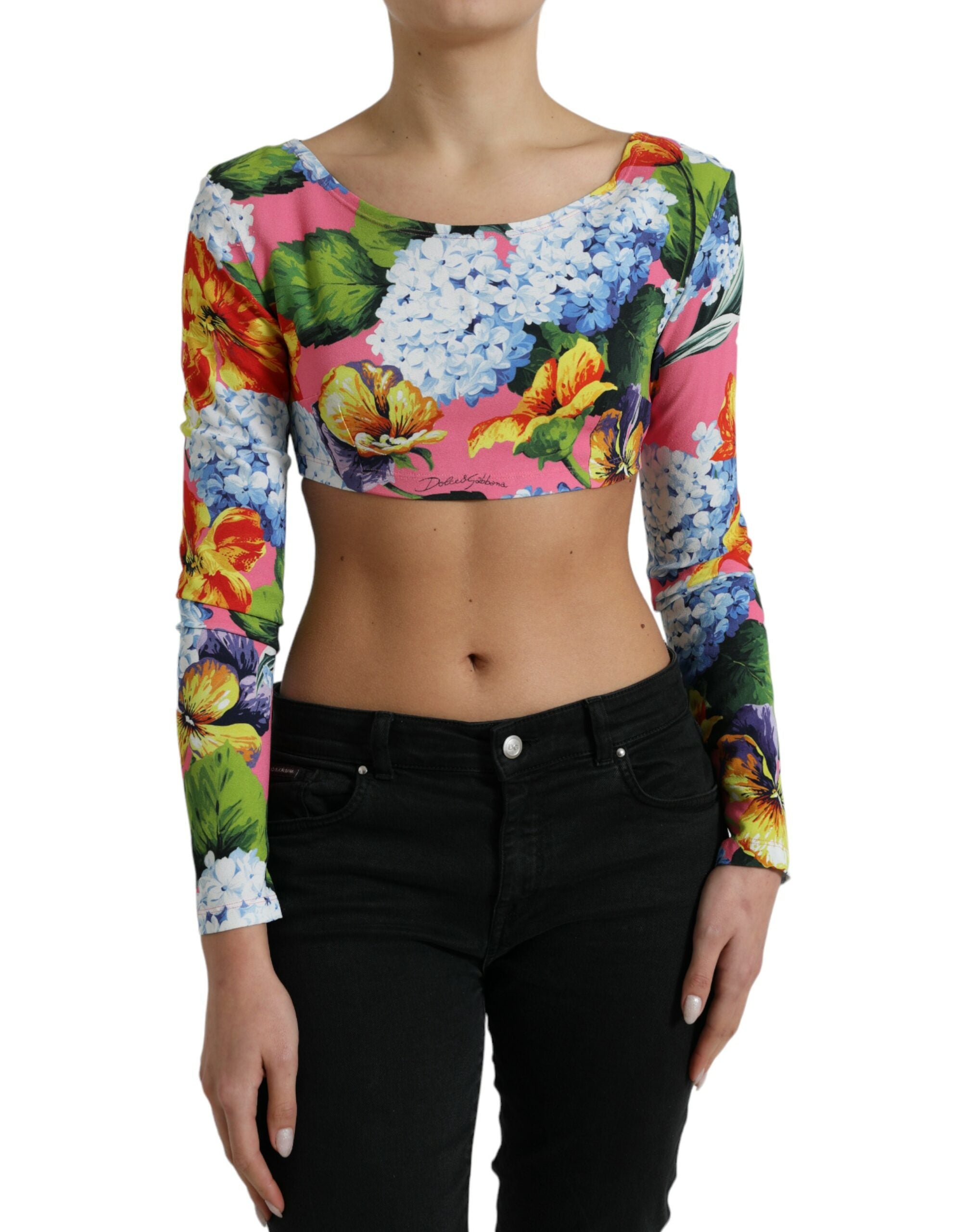 Multicolor floral long-sleeve cropped top by Dolce & Gabbana featuring vibrant floral pattern and fitted design.