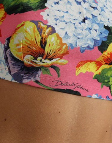 Multicolor floral long-sleeve cropped top by Dolce & Gabbana featuring vibrant floral print and fitted long sleeves.