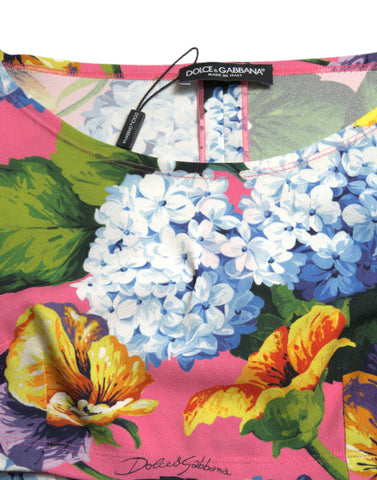 Multicolor floral long-sleeve cropped top by Dolce & Gabbana, featuring vibrant floral pattern and fitted design.