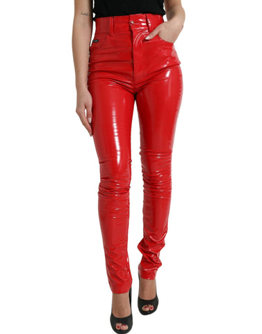 Shiny red high-waist skinny pants by Dolce & Gabbana, fitted with a sleek, glossy fabric and classic high-rise design.