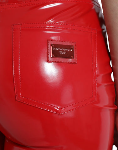 Shiny red high-waist skinny pants by Dolce & Gabbana, fitted design with sleek fabric and stylish appearance.