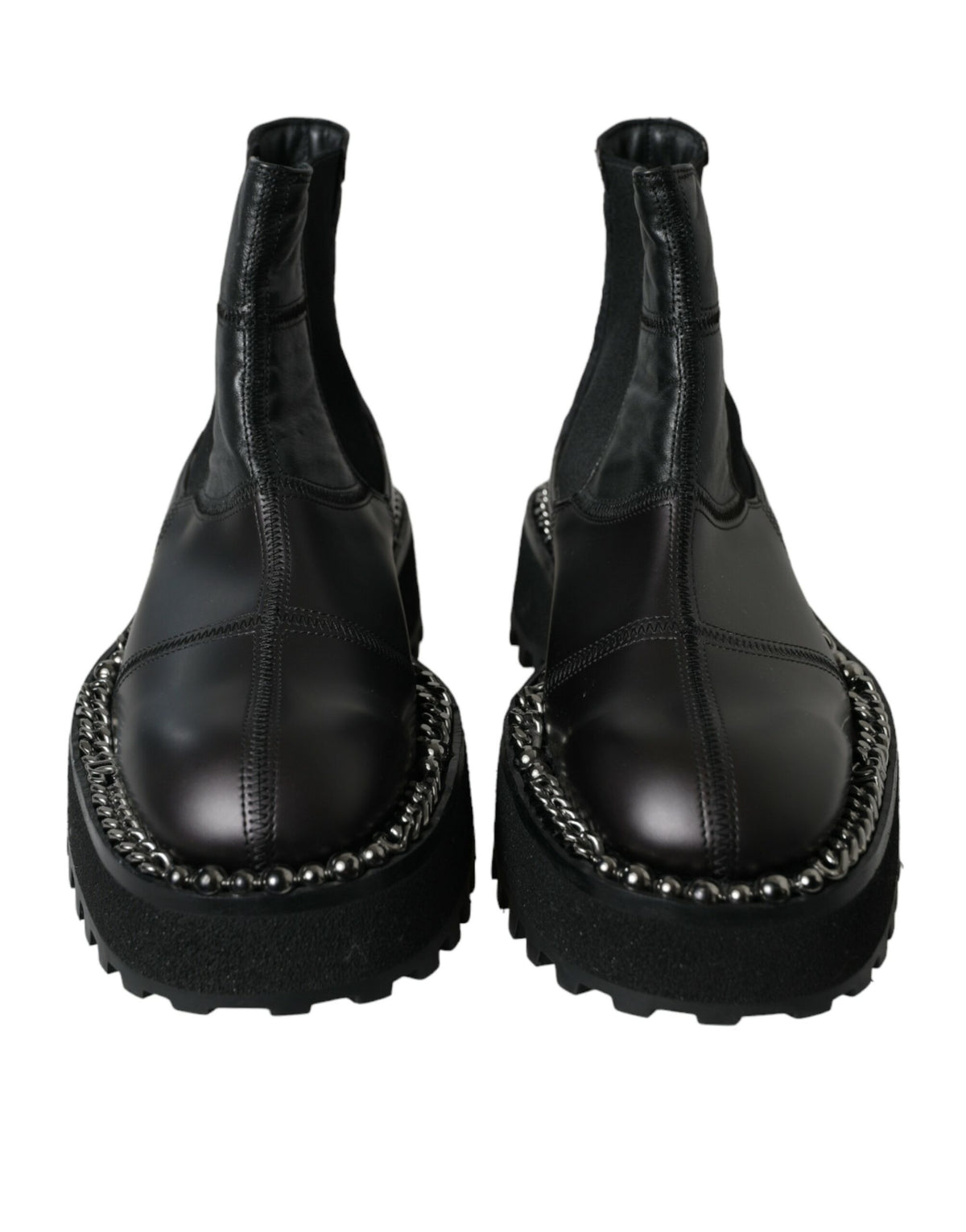 Black leather slip-on Chelsea boots by Dolce & Gabbana with stretch panels and sleek design, shown on a clean white background.