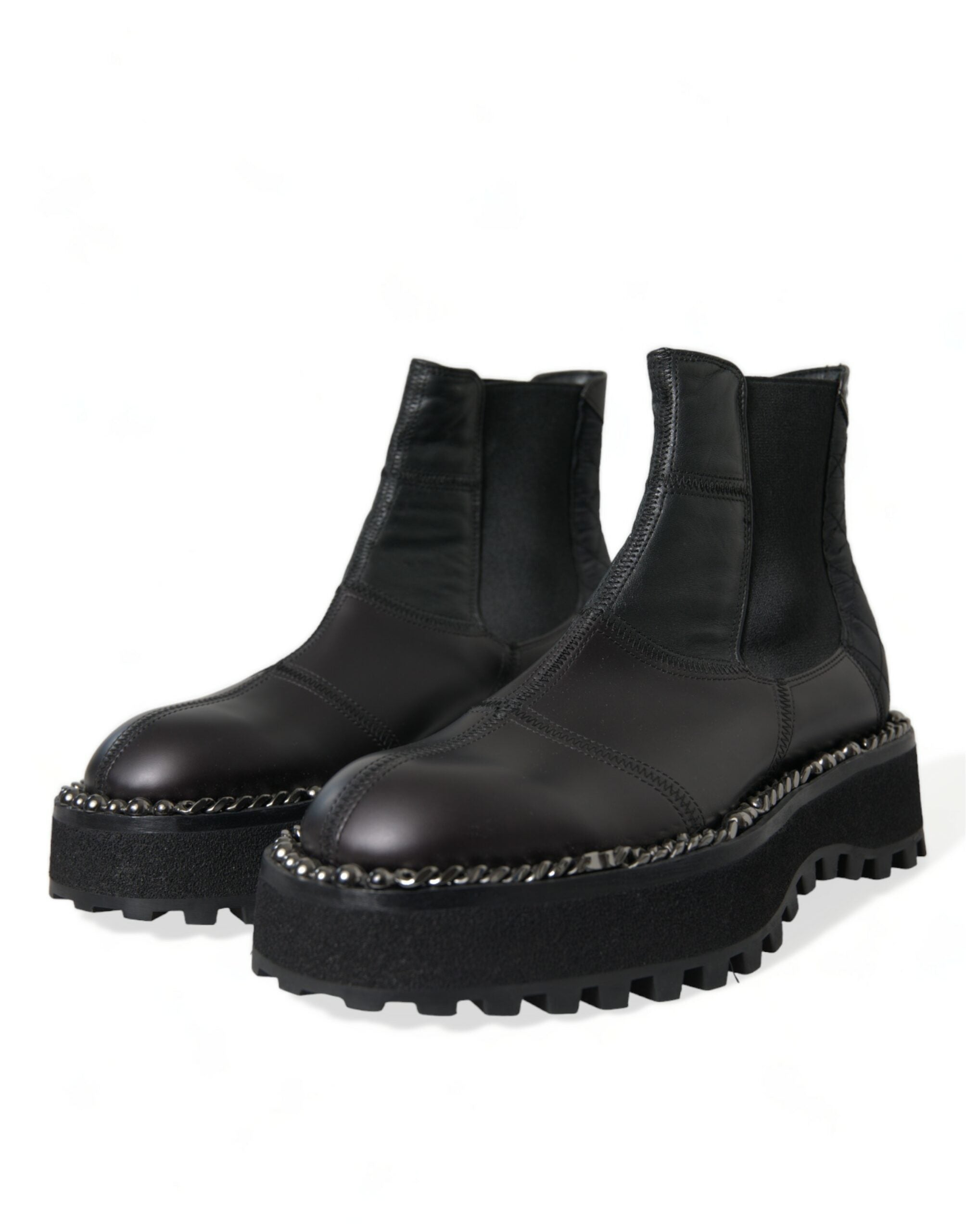 Black leather slip-on Chelsea boots by Dolce & Gabbana with stretch panels, sleek design, and rounded toe.