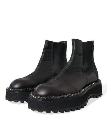 Black leather slip-on Chelsea boots by Dolce & Gabbana with stretch panels, sleek design, and rounded toe.