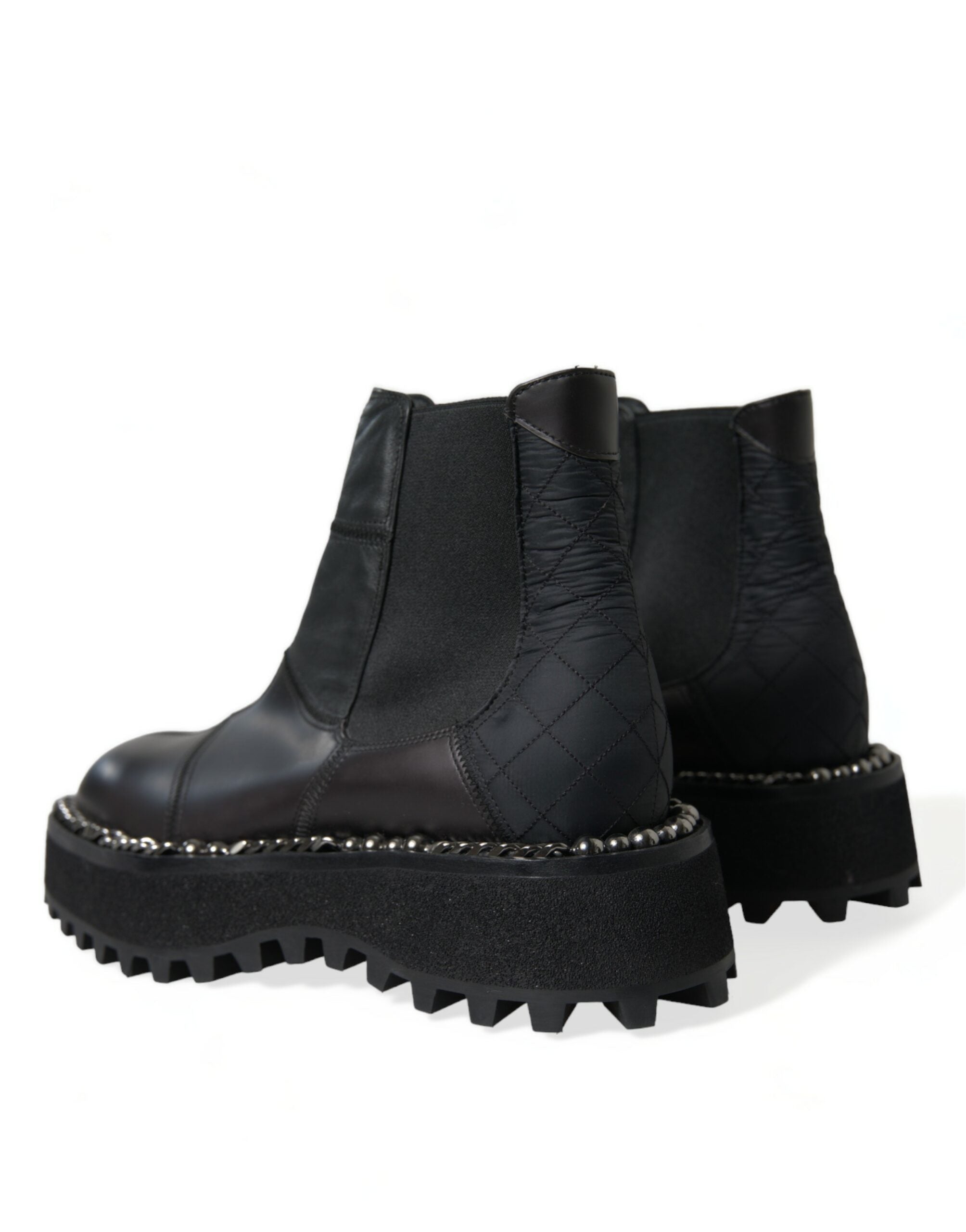 Black leather slip-on Chelsea boots by Dolce & Gabbana, featuring stretch panels for a sleek and comfortable fit.