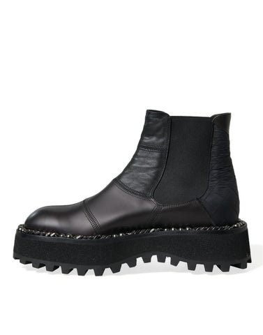 Black leather slip-on Chelsea boots by Dolce & Gabbana, featuring stretch panels and sleek design for stylish everyday wear.