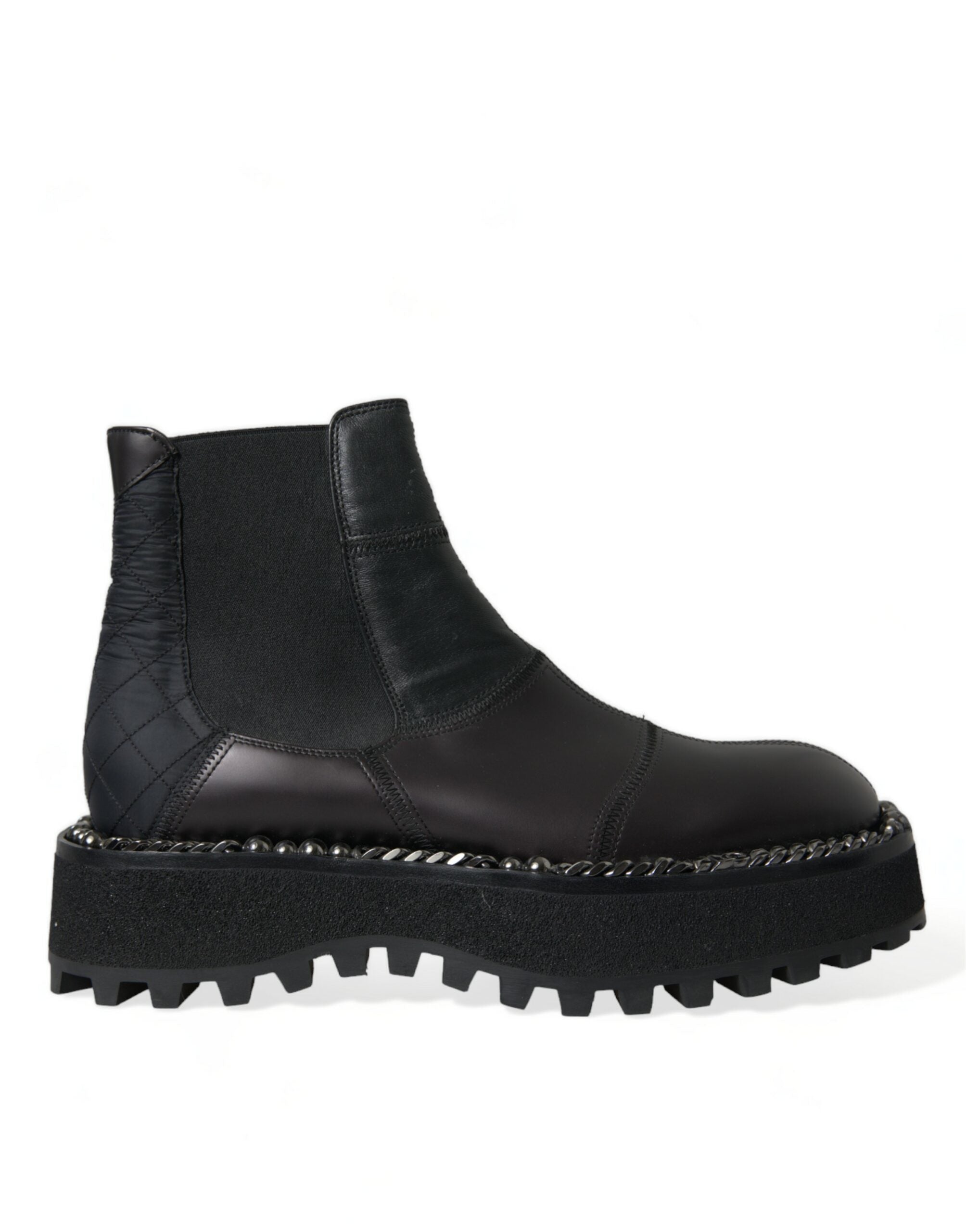Black leather slip-on Chelsea boots by Dolce & Gabbana with stretch panels, sleek design, and classic ankle-high style.