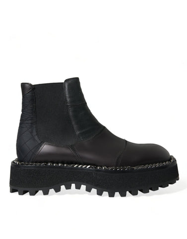Black leather slip-on Chelsea boots by Dolce & Gabbana with stretch panels, sleek design, and classic ankle-high style.
