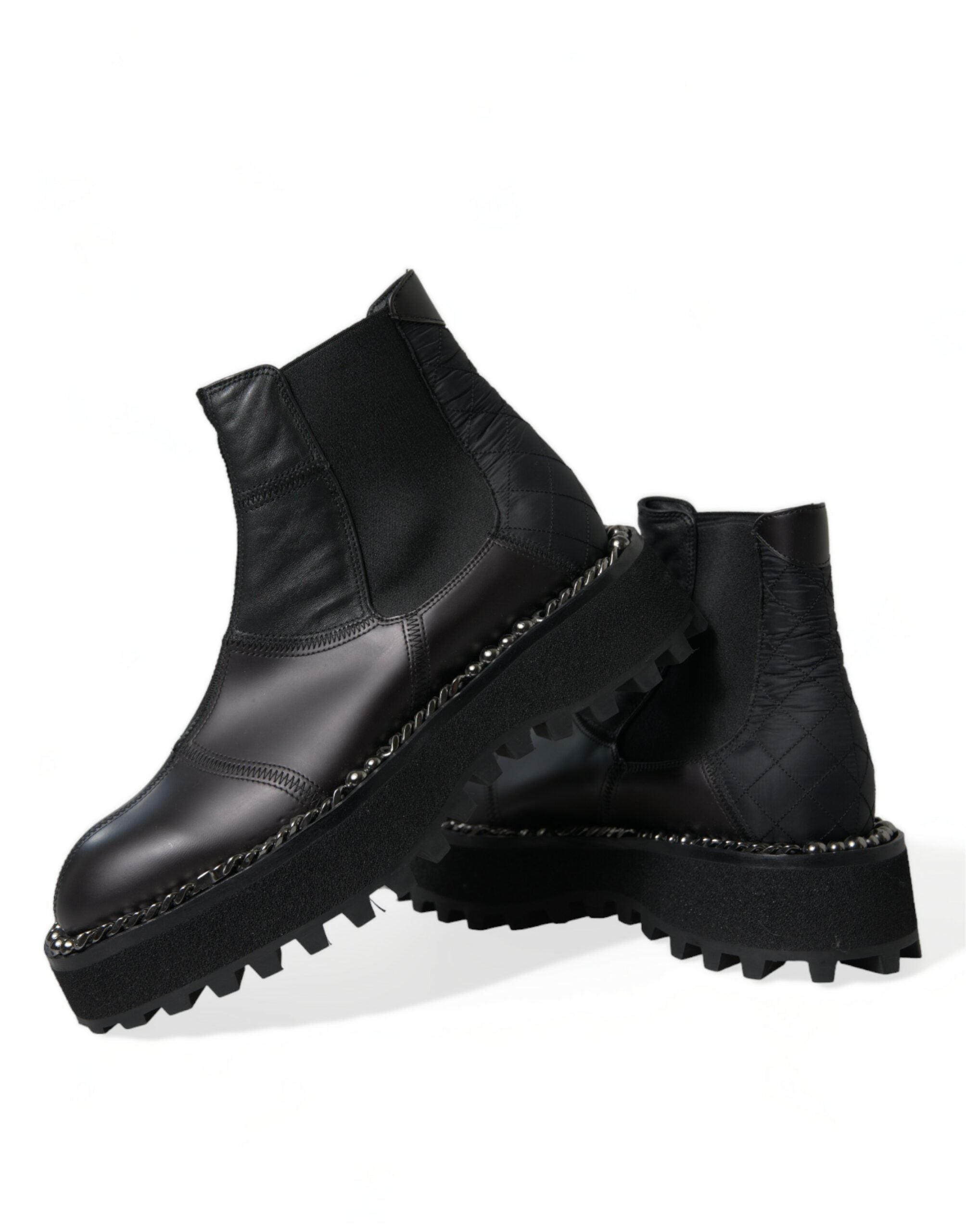 Black leather slip-on Chelsea boots by Dolce & Gabbana featuring stretch panels and sleek design.