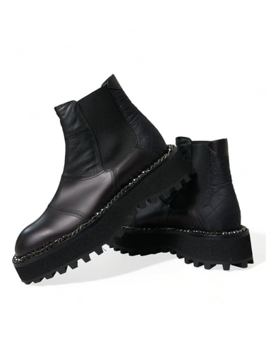 Black leather slip-on Chelsea boots by Dolce & Gabbana featuring stretch panels and sleek design.