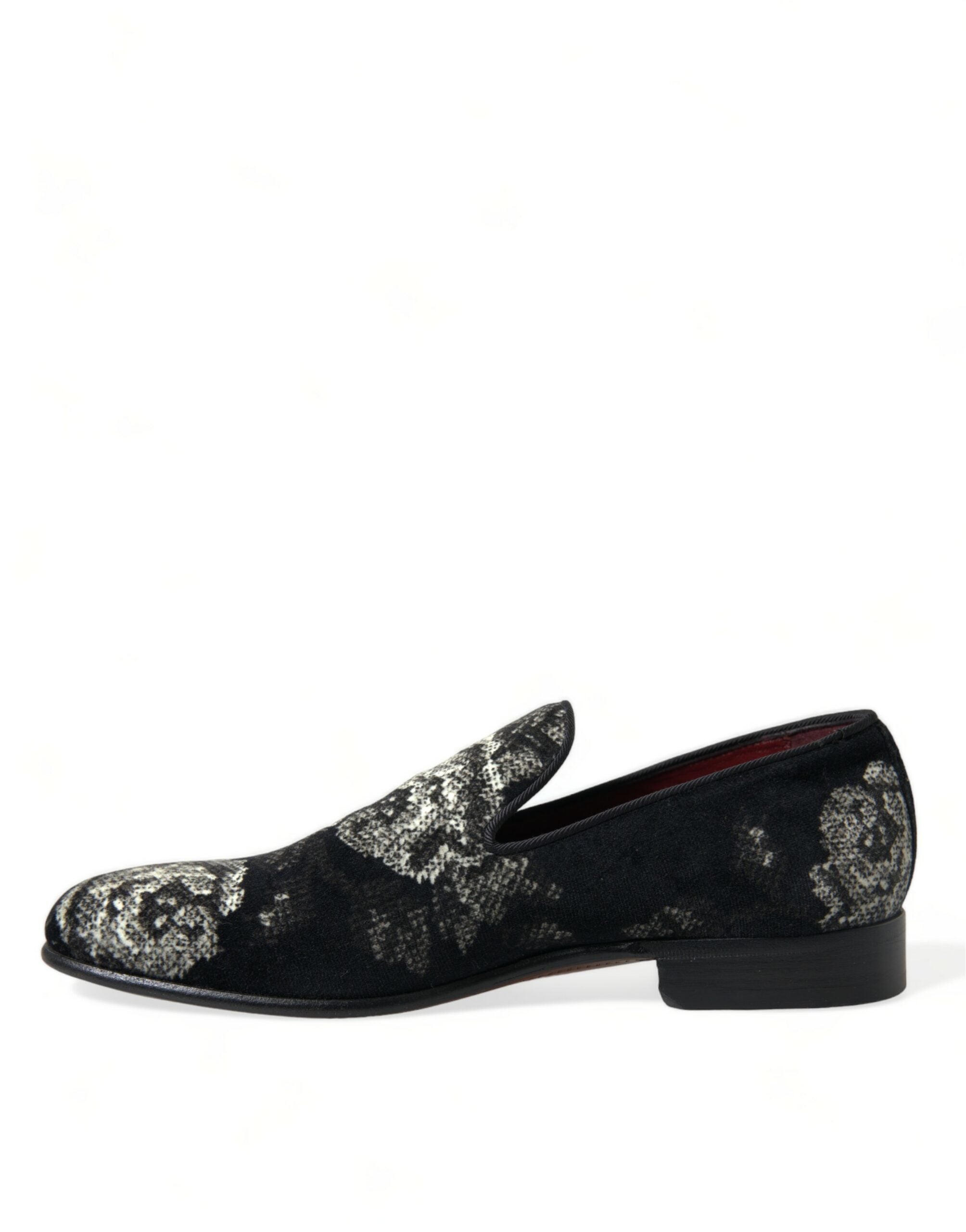 Black floral loafers for men by Dolce & Gabbana, stylish dress slippers with floral pattern and sleek design.