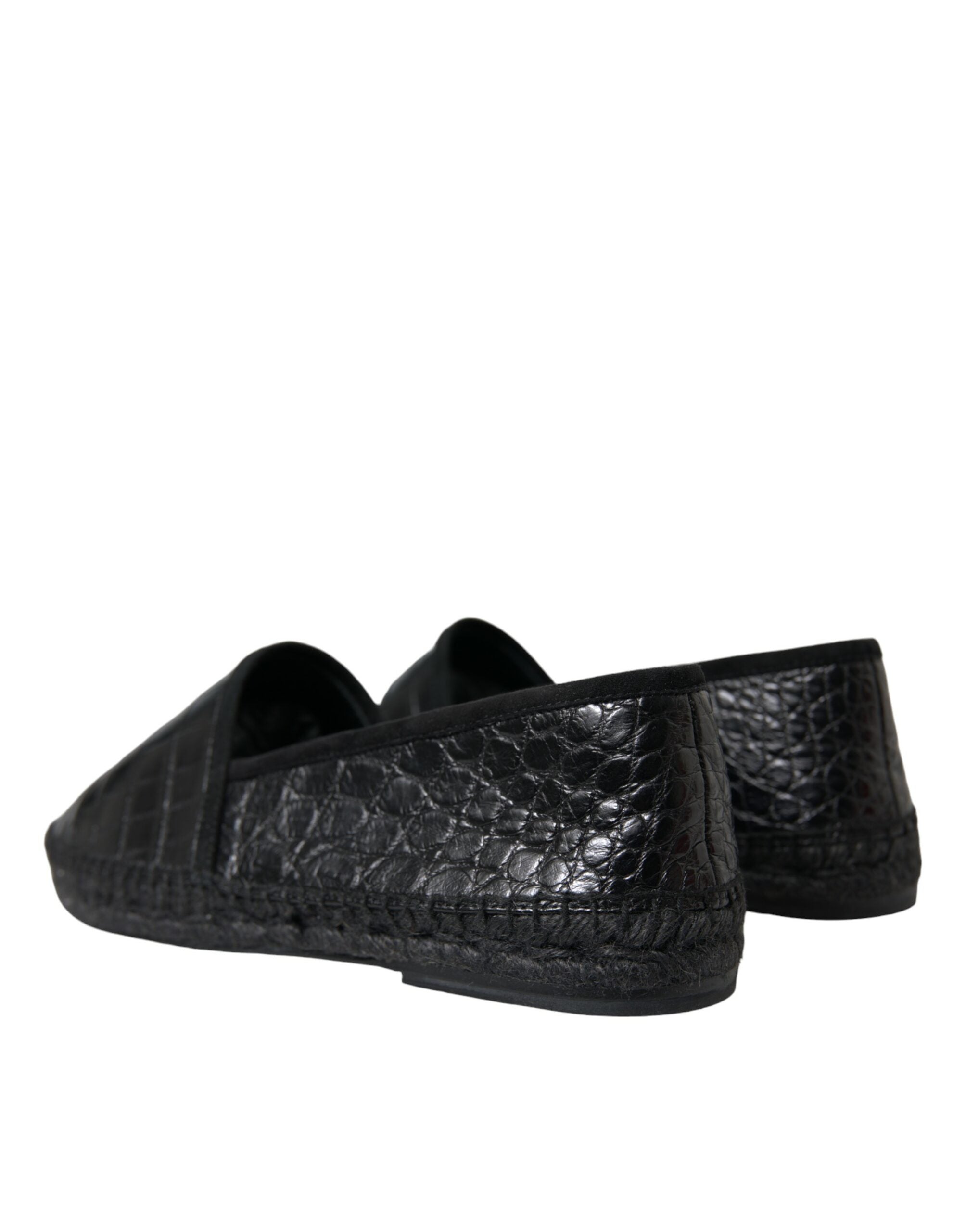 Black exotic leather espadrille slip-on shoes by Dolce & Gabbana, featuring textured leather upper and comfortable flat sole.