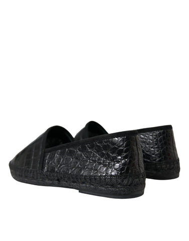 Black exotic leather espadrille slip-on shoes by Dolce & Gabbana, featuring textured leather upper and comfortable flat sole.