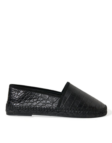 Black exotic leather espadrille slip-on shoes by Dolce & Gabbana with woven jute soles and sleek design.