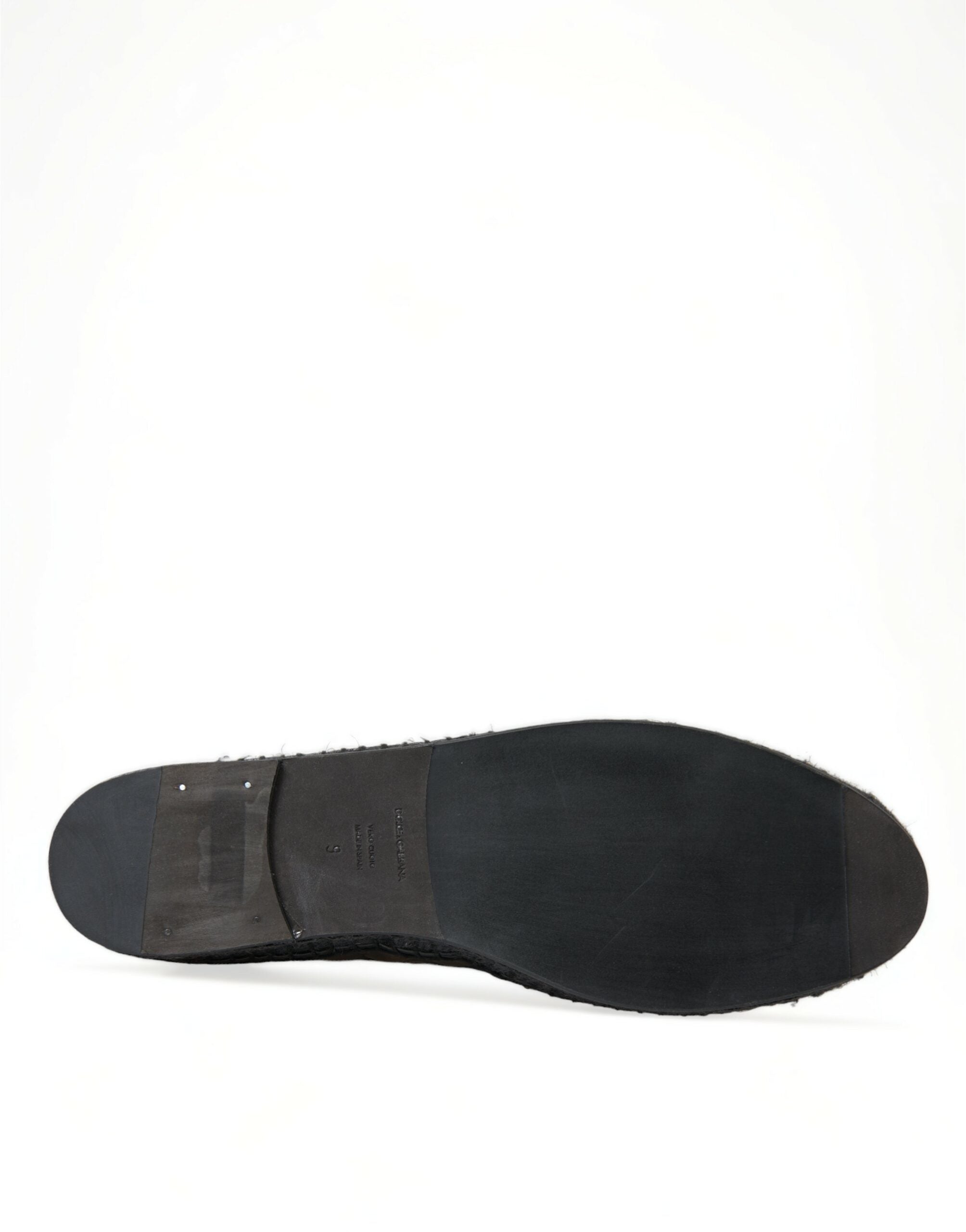 Black exotic leather Dolce & Gabbana espadrille slip-on shoes with a stylish, textured design and comfortable flat sole.