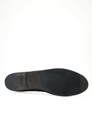 Black exotic leather Dolce & Gabbana espadrille slip-on shoes with a stylish, textured design and comfortable flat sole.