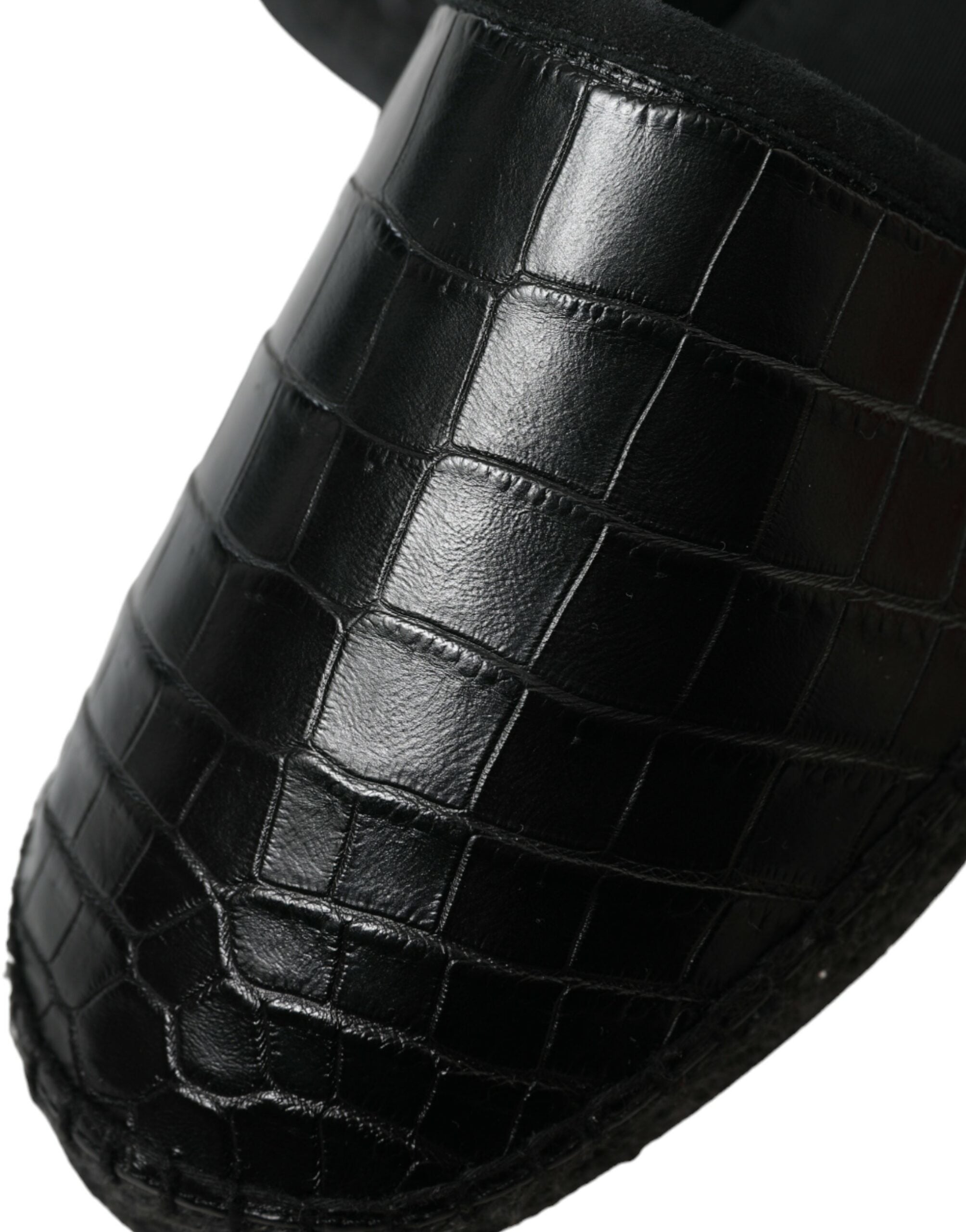 Black exotic leather espadrilles slip-on shoes by Dolce & Gabbana featuring textured leather and comfortable flat soles.