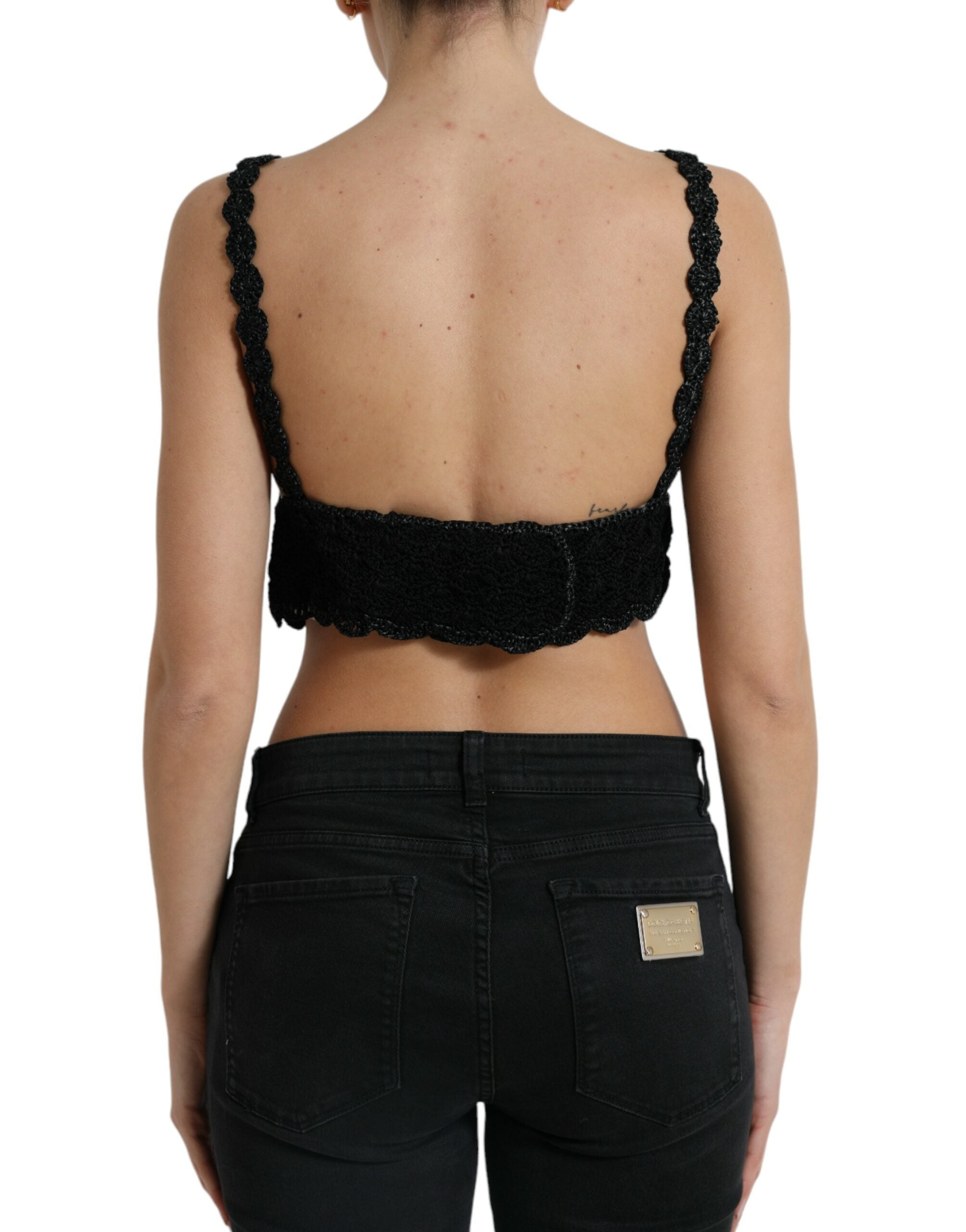 Black cotton bustier cropped crochet tank top by Dolce & Gabbana, featuring intricate crochet details and a fitted sleeveless design.