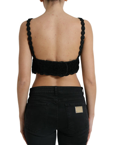 Black cotton bustier cropped crochet tank top by Dolce & Gabbana, featuring intricate crochet details and a fitted sleeveless design.
