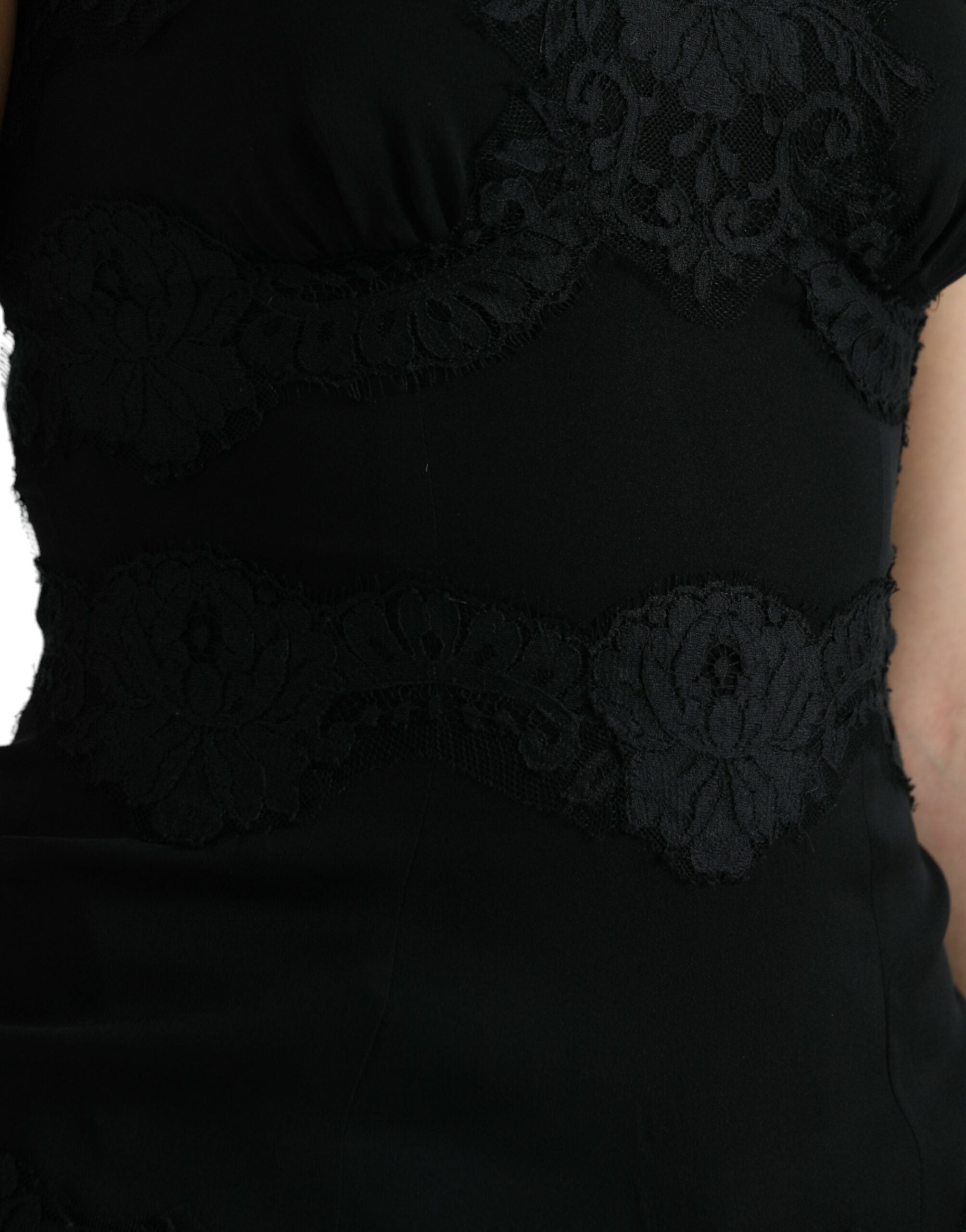 Black silk stretch lace sleeveless tank top by Dolce & Gabbana, featuring delicate lace detailing and a fitted silhouette.
