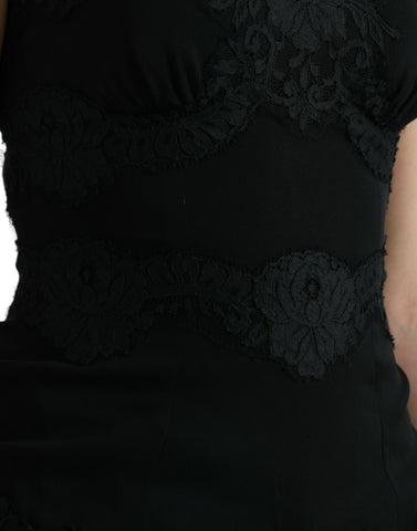 Black silk stretch lace sleeveless tank top by Dolce & Gabbana, featuring delicate lace detailing and a fitted silhouette.