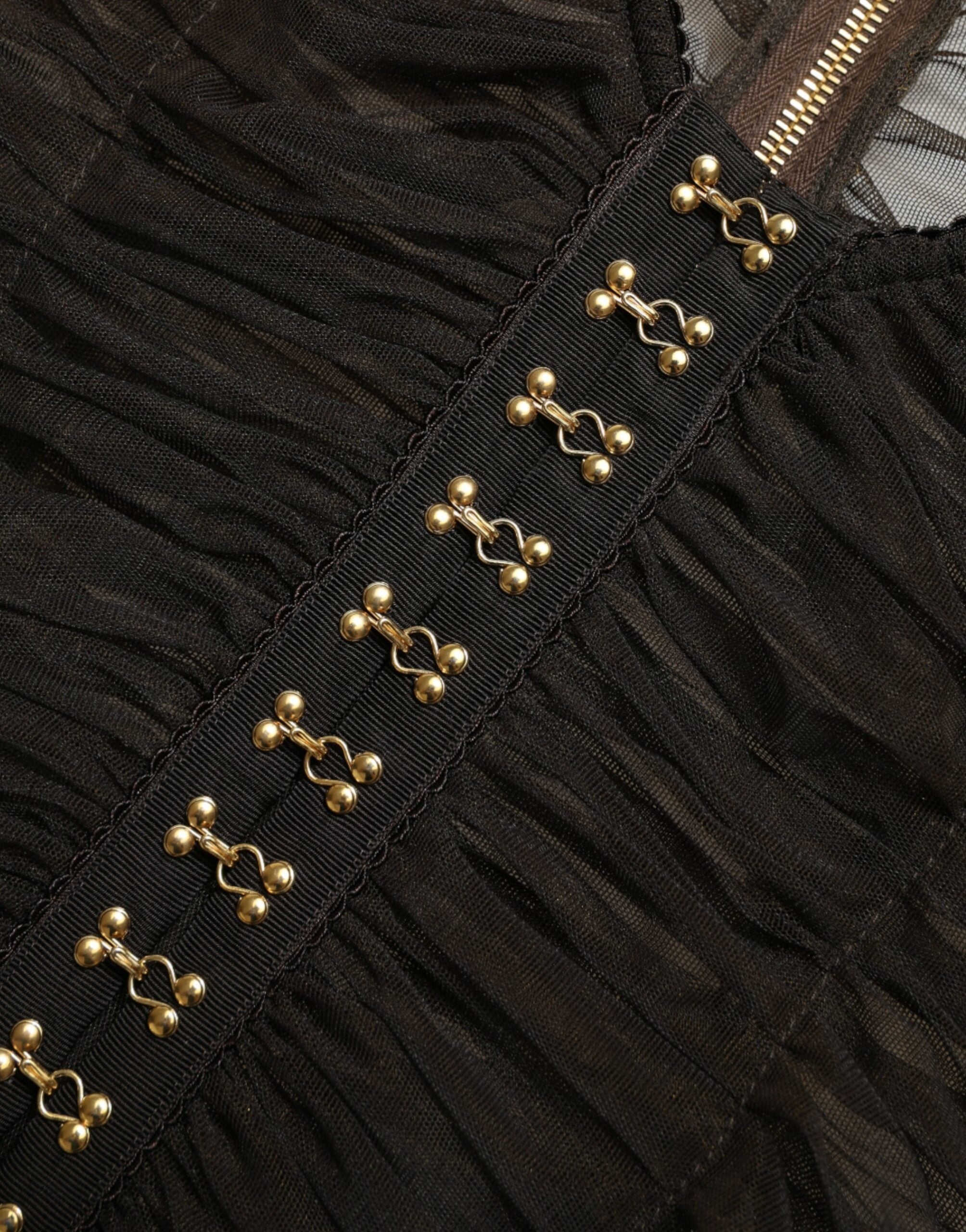 Brown embellished nylon stretch cropped top by Dolce & Gabbana with decorative details and a fitted, stylish design.