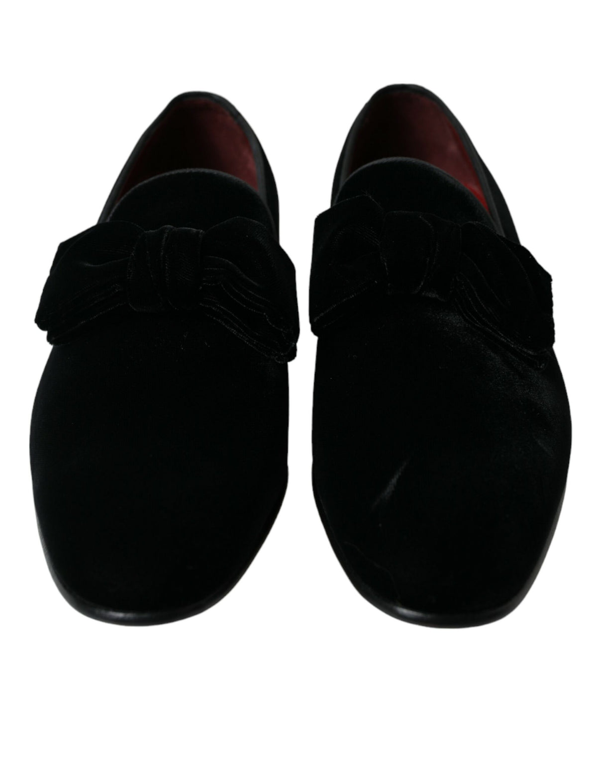 Black velvet loafers by Dolce & Gabbana, formal dress shoes with sleek design and polished finish, ideal for elegant occasions.