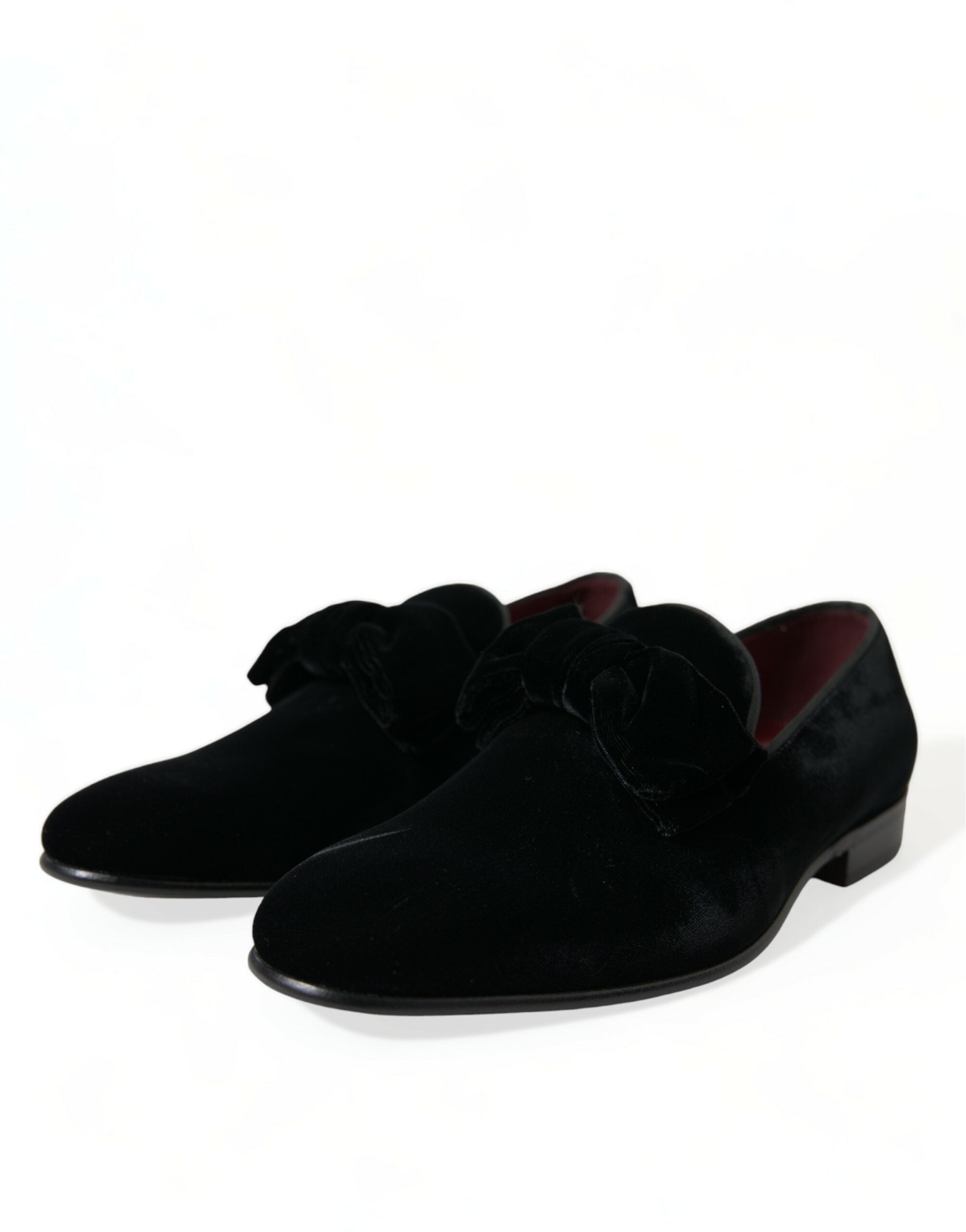 Black velvet loafers by Dolce & Gabbana, formal dress shoes with sleek design and polished finish, perfect for elegant occasions.